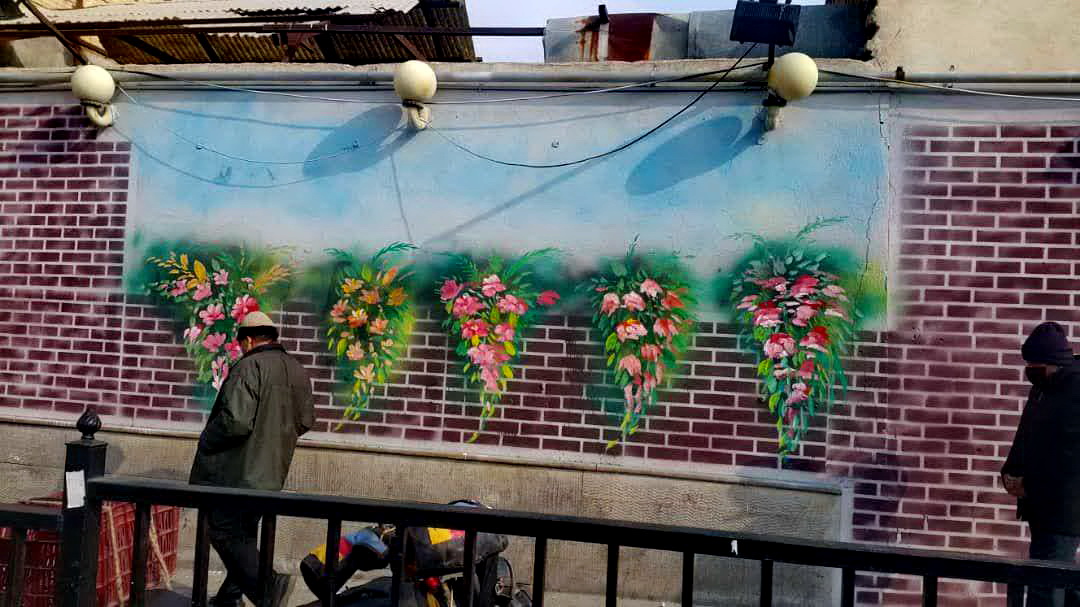 اجرای نقاشی دیواری طرح سنتی در دیوارهای بد منظر سطح حوزه